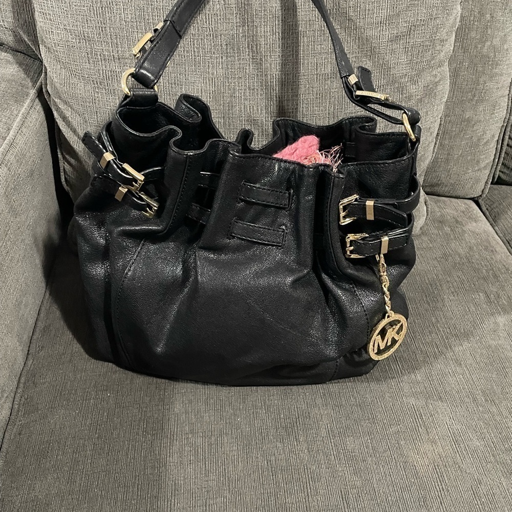 Micheal Kors women’s black leather Handbag